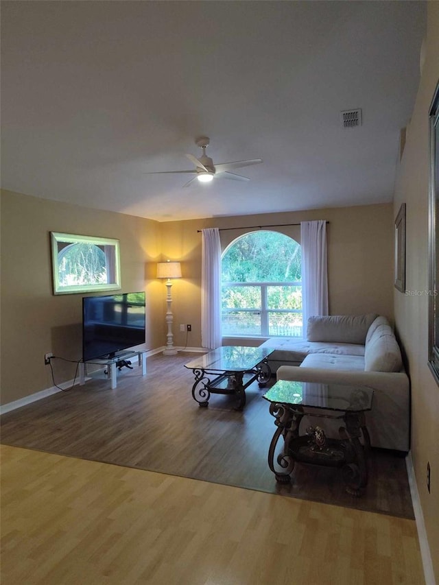 15900 SW 19th Avenue Rd, Ocala, FL 34473 - living area featuring wood finished floors and a ceiling fan