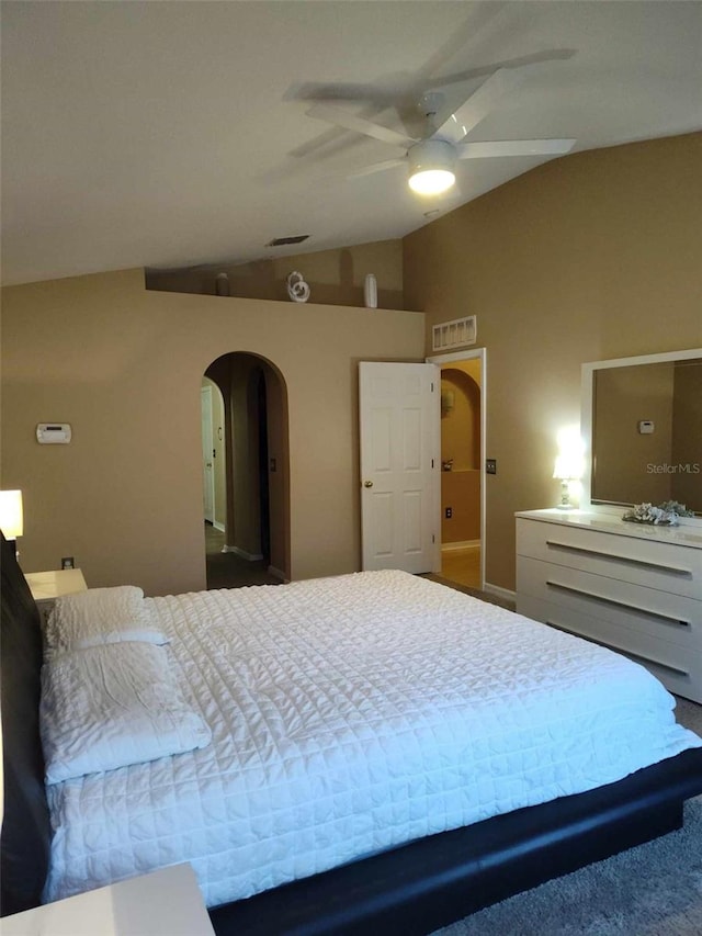 15900 SW 19th Avenue Rd, Ocala, FL 34473 - bedroom featuring vaulted ceiling, arched walkways, and a ceiling fan