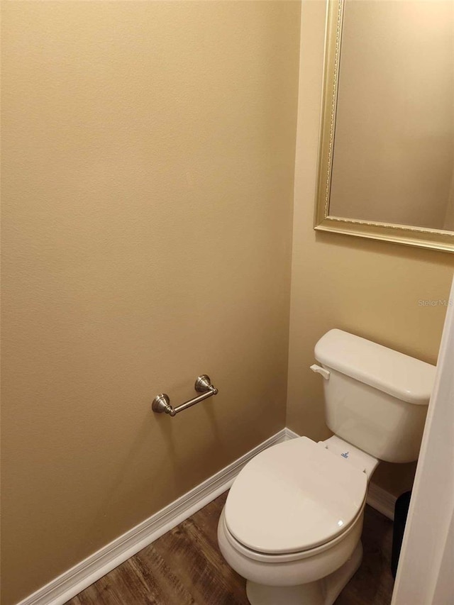 15900 SW 19th Avenue Rd, Ocala, FL 34473 - bathroom with baseboards and wood finished floors