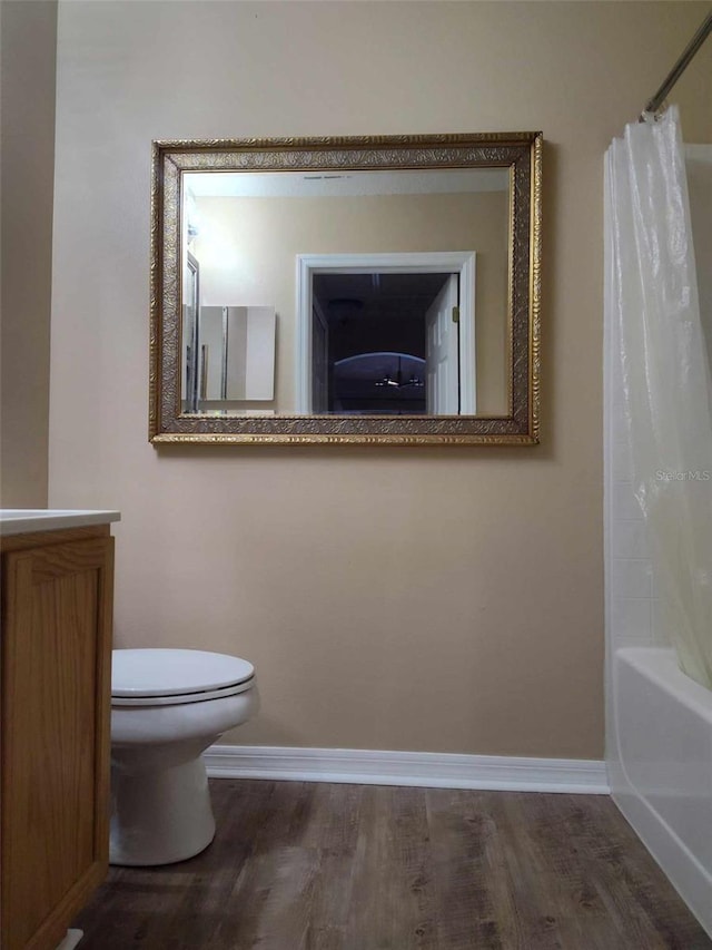 15900 SW 19th Avenue Rd, Ocala, FL 34473 - bathroom featuring wood finished floors and shower / bath combo