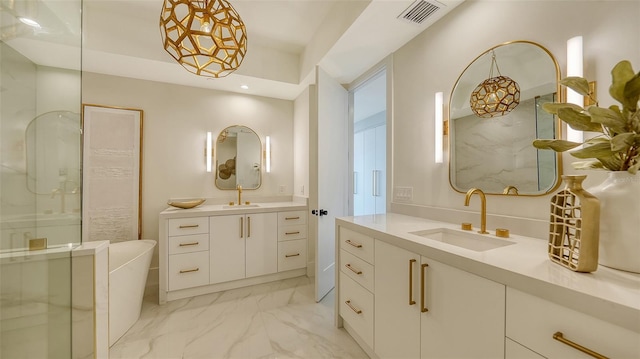 bathroom with an enclosed shower and vanity