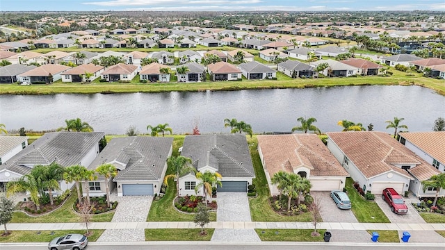 bird's eye view with a water view