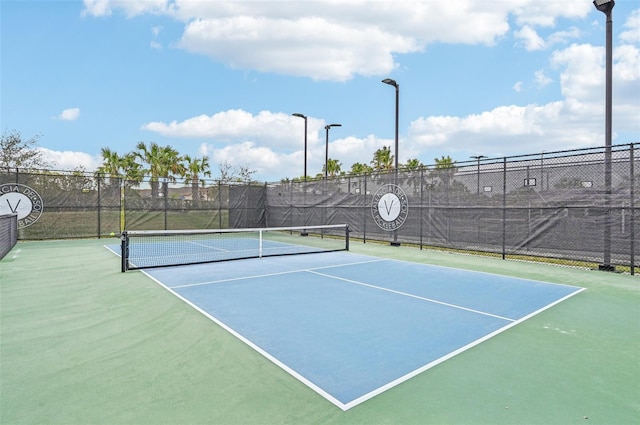 view of sport court featuring basketball court