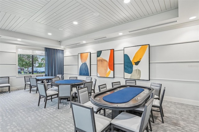 recreation room featuring carpet floors and wooden ceiling