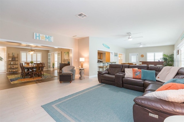 living room with ceiling fan