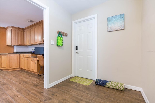 interior space with dark wood-type flooring