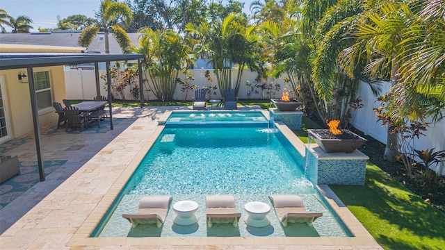 view of pool featuring a patio area and pool water feature