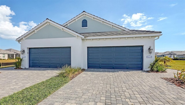 view of front of property featuring a garage