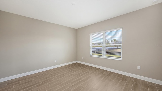 empty room featuring light hardwood / wood-style floors