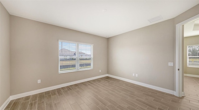 empty room featuring light hardwood / wood-style floors