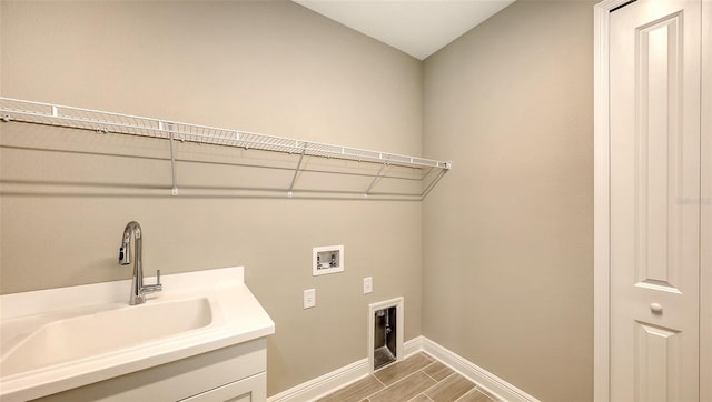 laundry room featuring sink, electric dryer hookup, and hookup for a washing machine