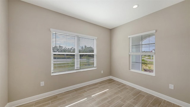 spare room with a healthy amount of sunlight