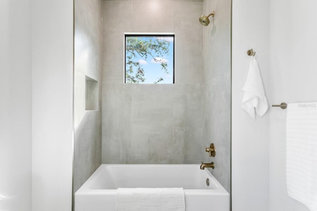 bathroom with shower / bathing tub combination