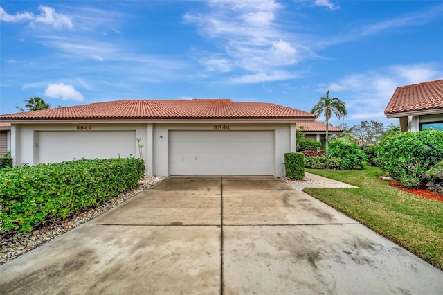 garage with a yard