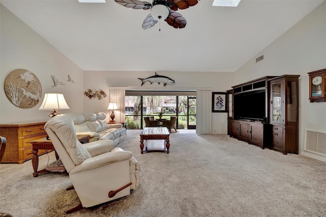 living room with ceiling fan, carpet, and high vaulted ceiling