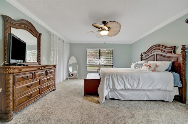 bedroom featuring ceiling fan with notable chandelier, crown molding, and light carpet