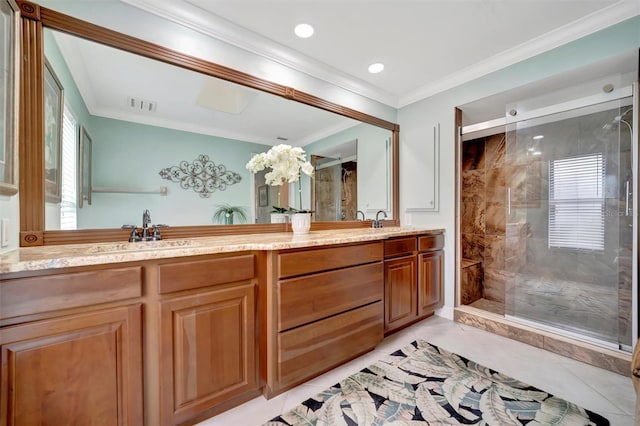 bathroom with a shower with door, ornamental molding, and vanity