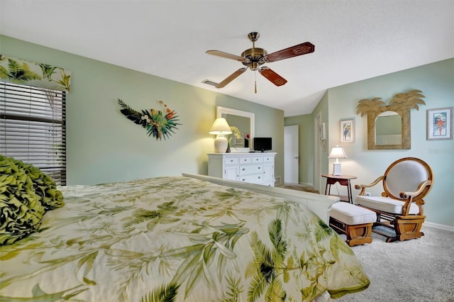 bedroom with ceiling fan and carpet