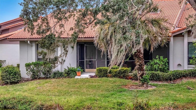 view of front of home with a front yard