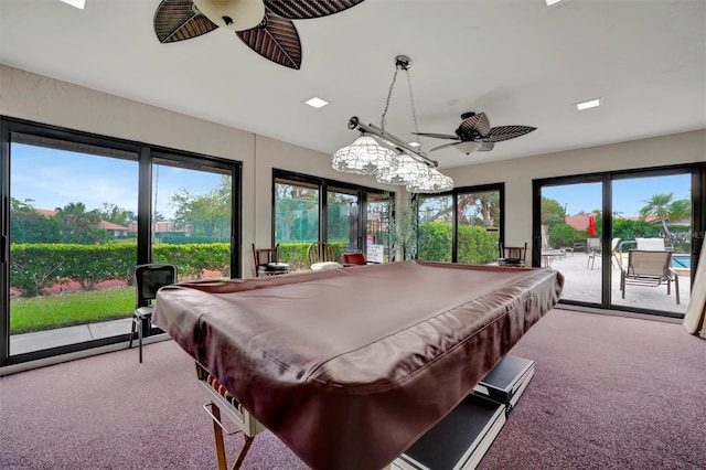 game room featuring pool table, carpet flooring, ceiling fan, and plenty of natural light