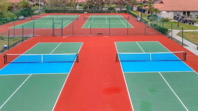 view of sport court featuring basketball hoop