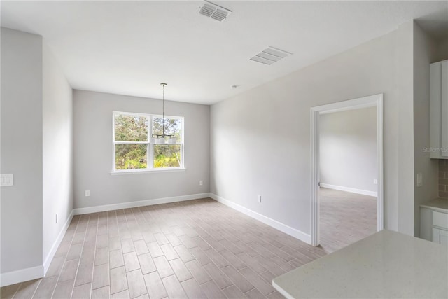 interior space with a notable chandelier