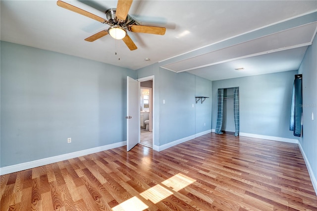 unfurnished bedroom with light hardwood / wood-style flooring and ceiling fan