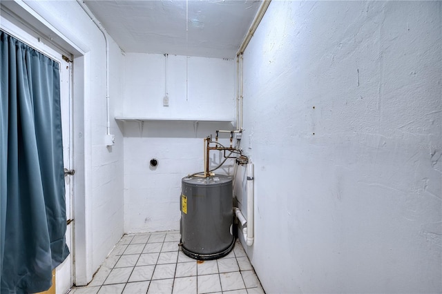 laundry room featuring water heater