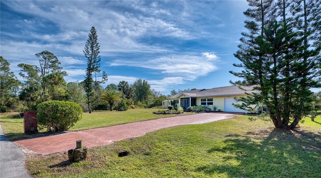 view of yard featuring a garage