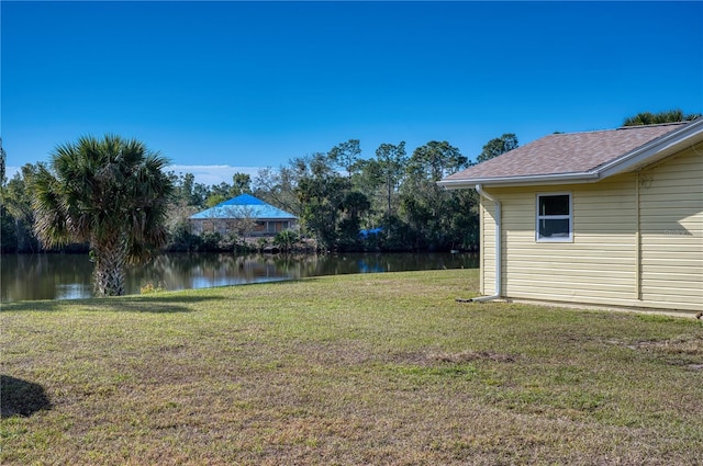 view of yard with a water view