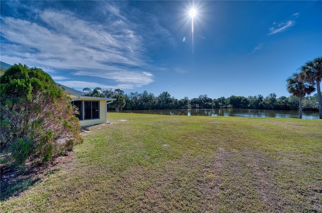 view of yard with a water view