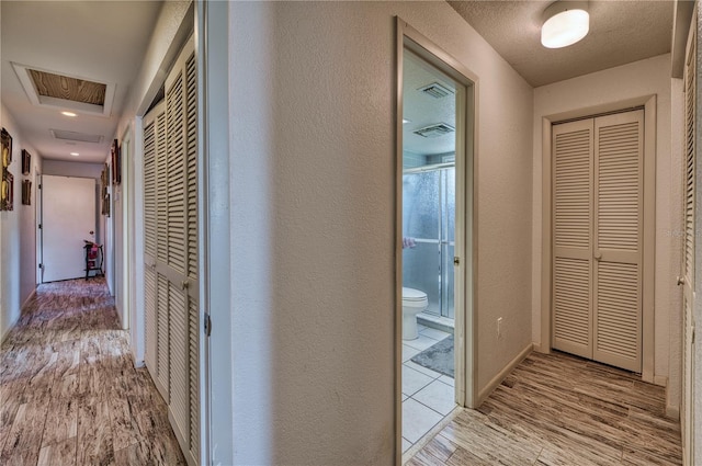 hall featuring light hardwood / wood-style flooring