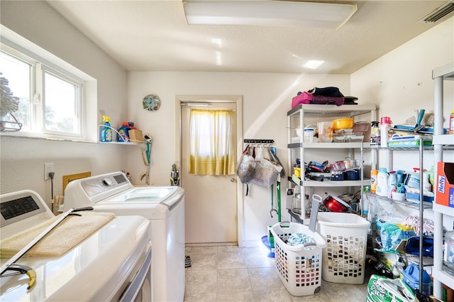 laundry area featuring separate washer and dryer