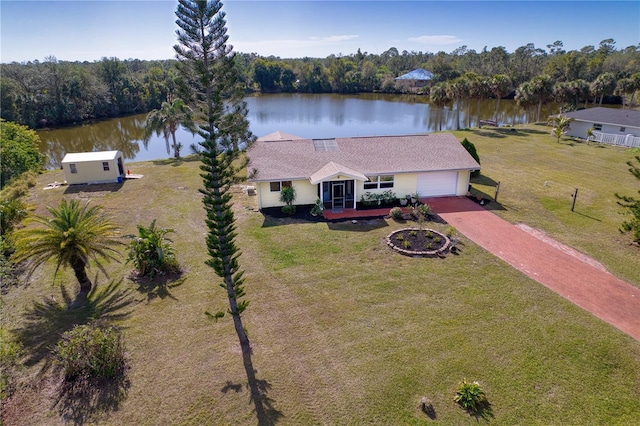 bird's eye view with a water view