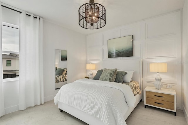 bedroom with an inviting chandelier