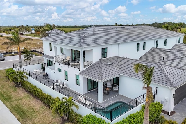 rear view of property with a patio