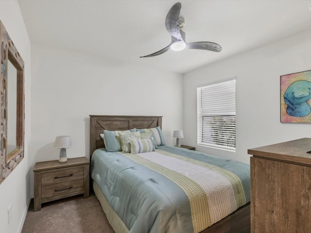 bedroom with ceiling fan and carpet