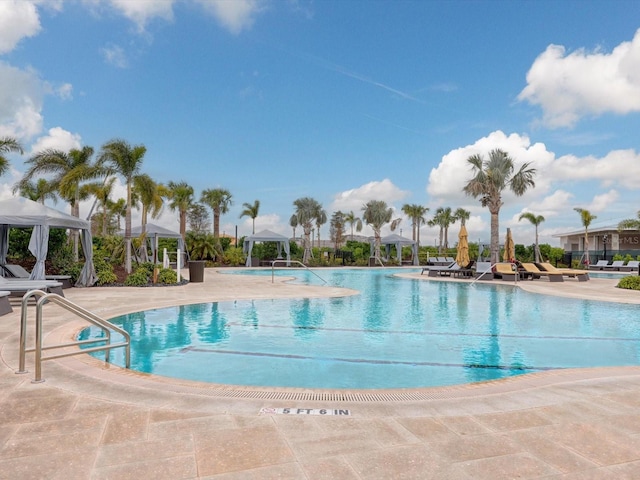 view of pool with a gazebo and a patio