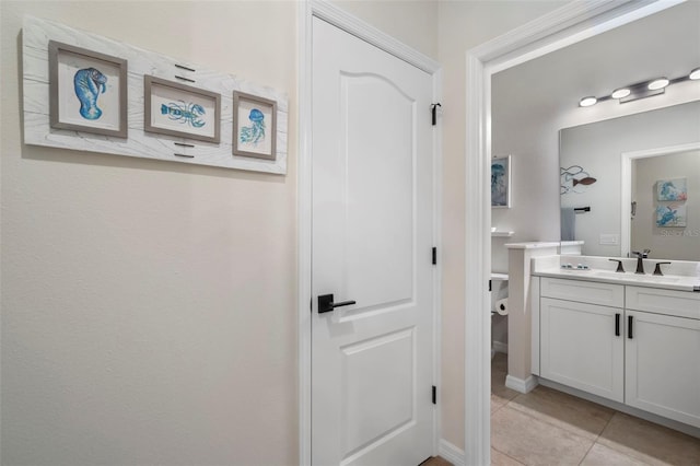 bathroom with vanity and tile patterned floors