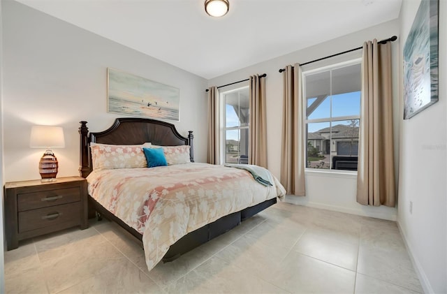 bedroom with light tile patterned flooring