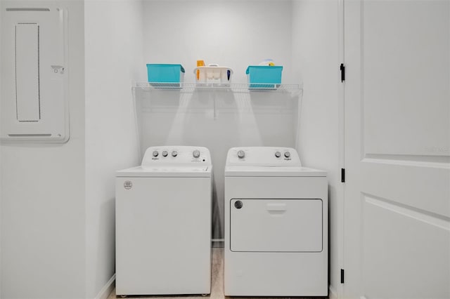 washroom featuring washer and dryer