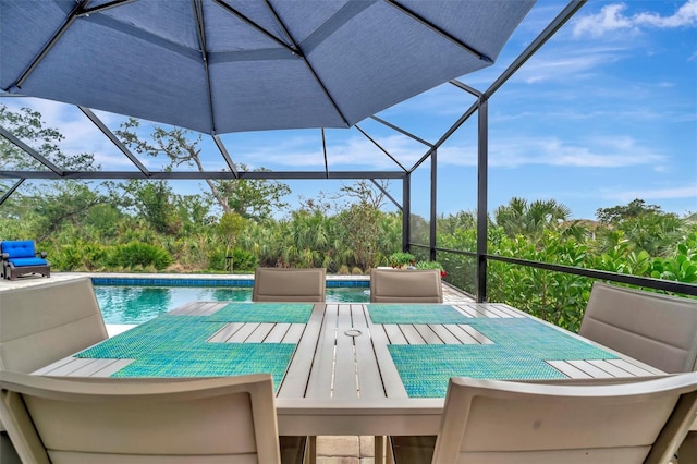 view of pool with a lanai