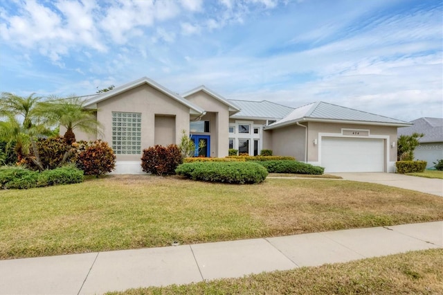 single story home featuring a front yard and a garage