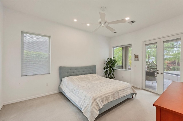 bedroom with ceiling fan, light carpet, access to outside, and french doors