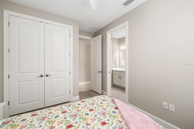 bedroom featuring ceiling fan and a closet