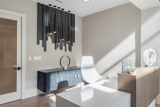 home office featuring hardwood / wood-style floors