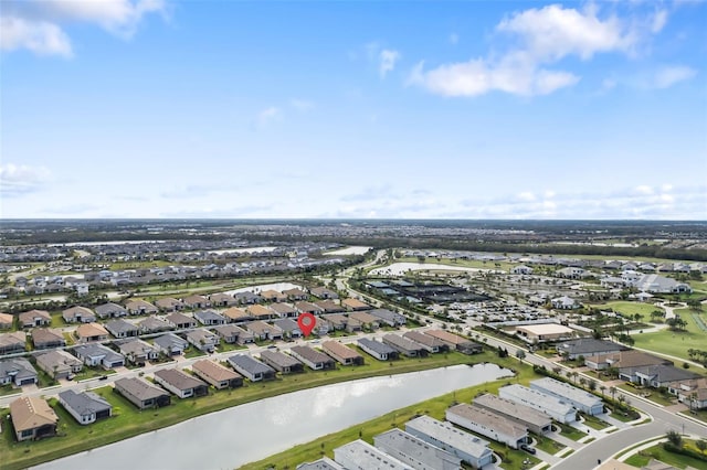 16127 Fortezza Dr, Bradenton, FL 34211 - aerial overview of property's location featuring nearby suburban area and a large body of water