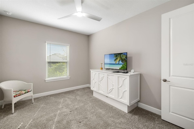 16127 Fortezza Dr, Bradenton, FL 34211 - sitting room featuring a ceiling fan and carpet floors