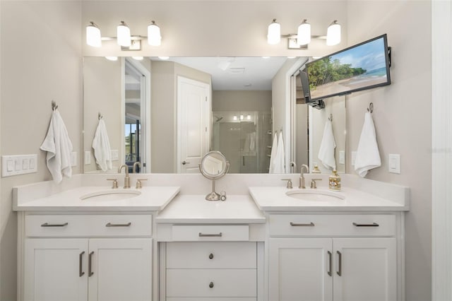 16127 Fortezza Dr, Bradenton, FL 34211 - bathroom with double vanity and a shower stall