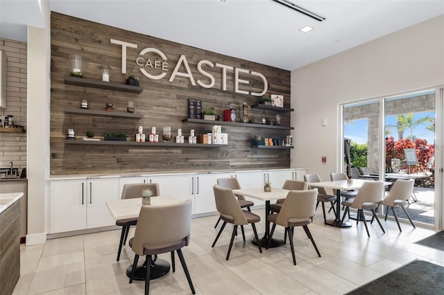 16127 Fortezza Dr, Bradenton, FL 34211 - dining area with wood walls